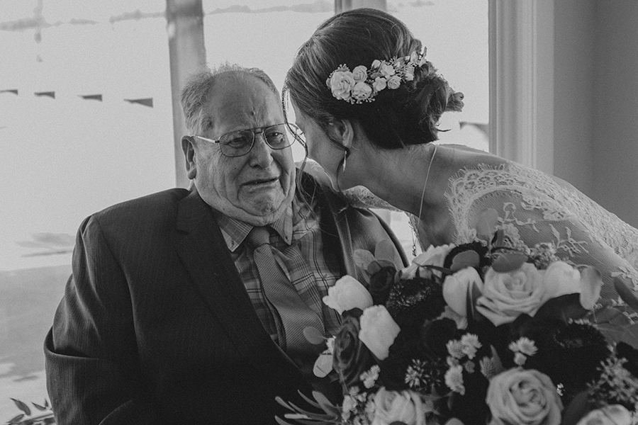grandfather and bride crying.